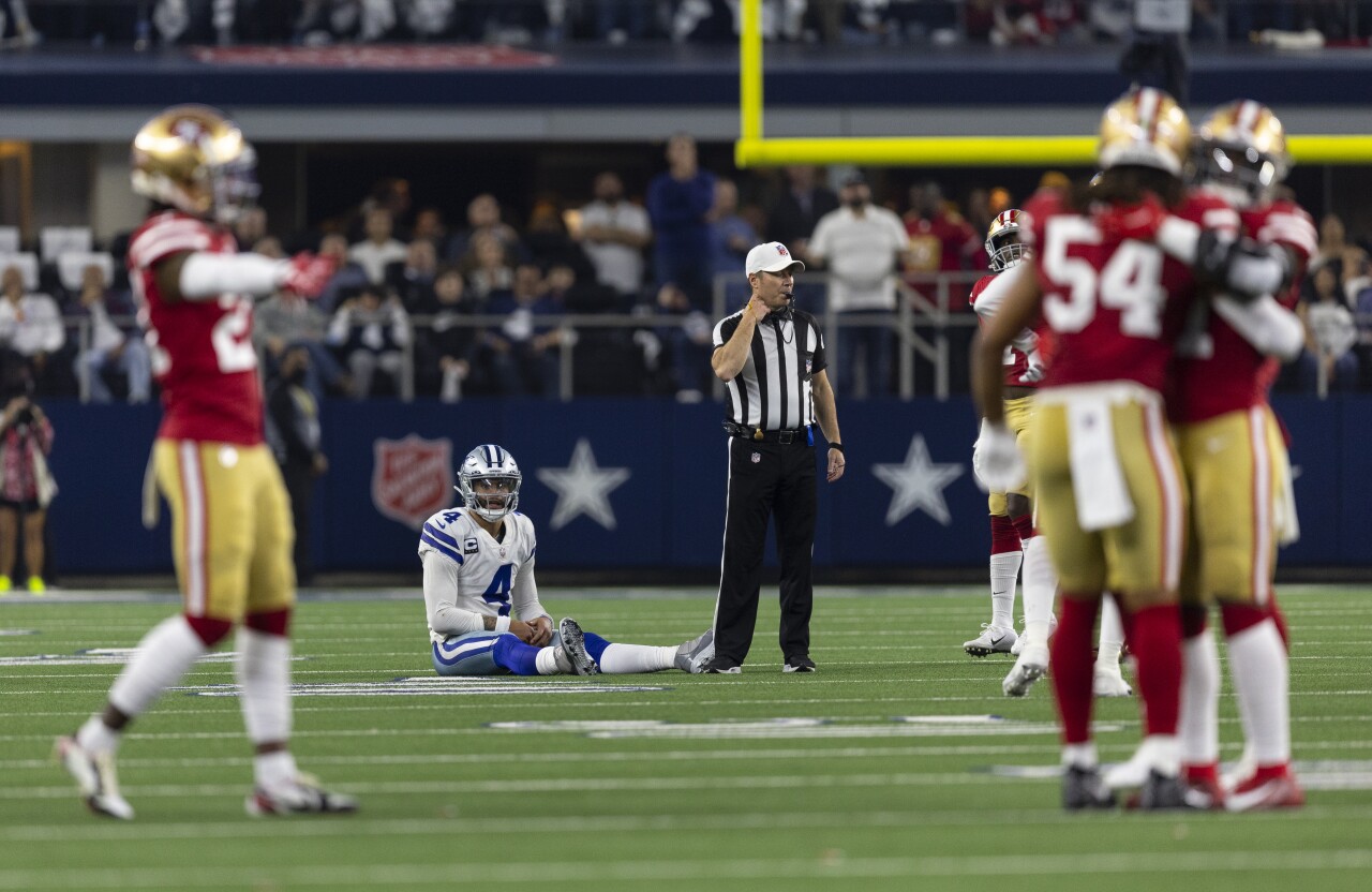 Dallas Cowboys QB Dak Prescott looks dejected after incomplete pass gives San Francisco 49ers possession of football in wild-card playoff game, Jan. 16, 2022