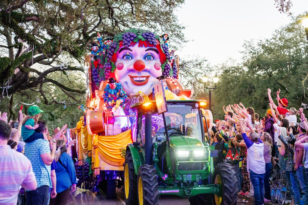 Attendees march during the annual Krewe of Bacchus parade during the Mardi Gras season in New Orleans.