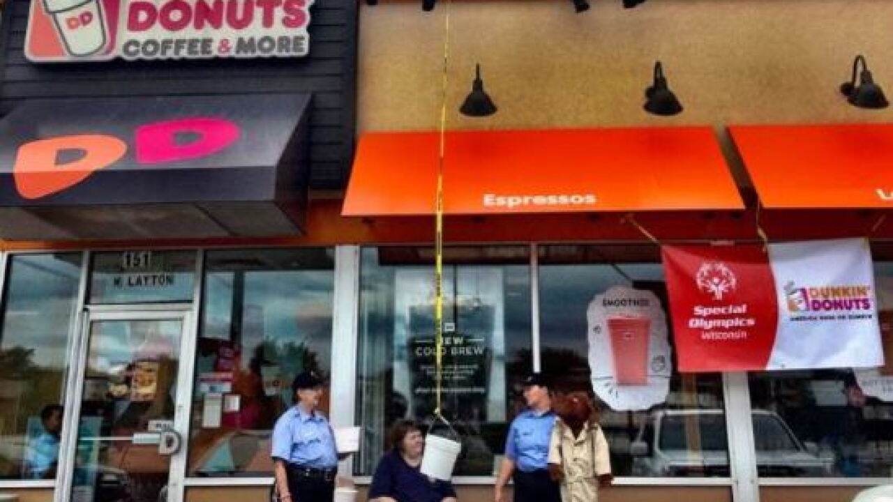 Cops stand on roofs to raise money for Special Olympics