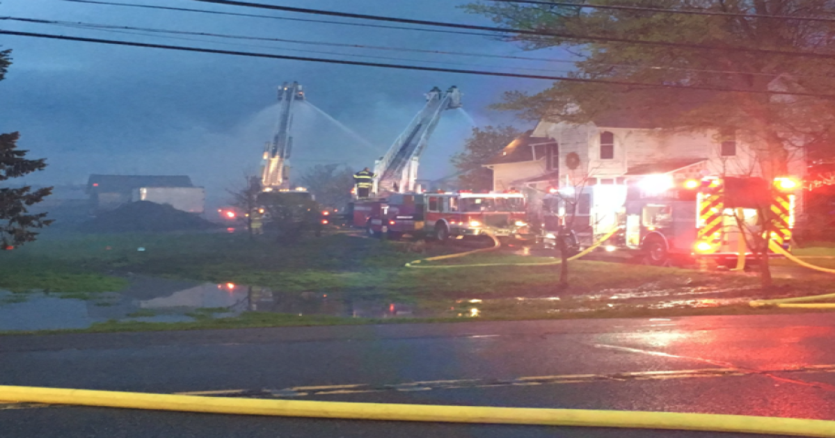 Fire crews battling barn fire in Orchard Park