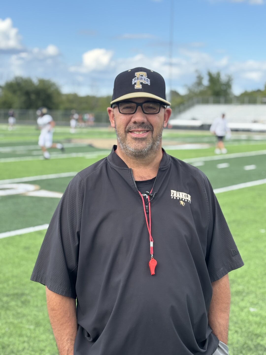 Head Coach Louis Brown