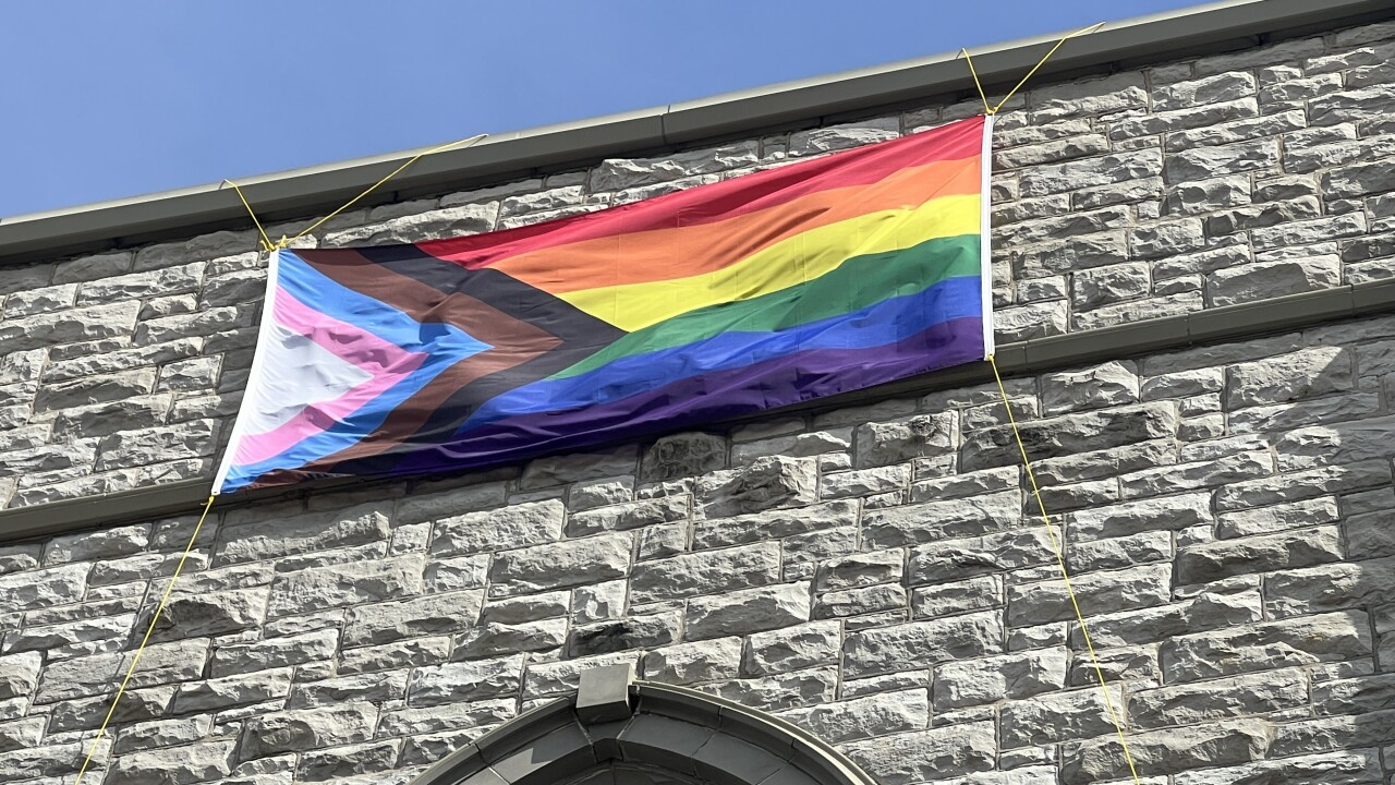 The First United Methodist Church flies a Pride flag on the side of its building