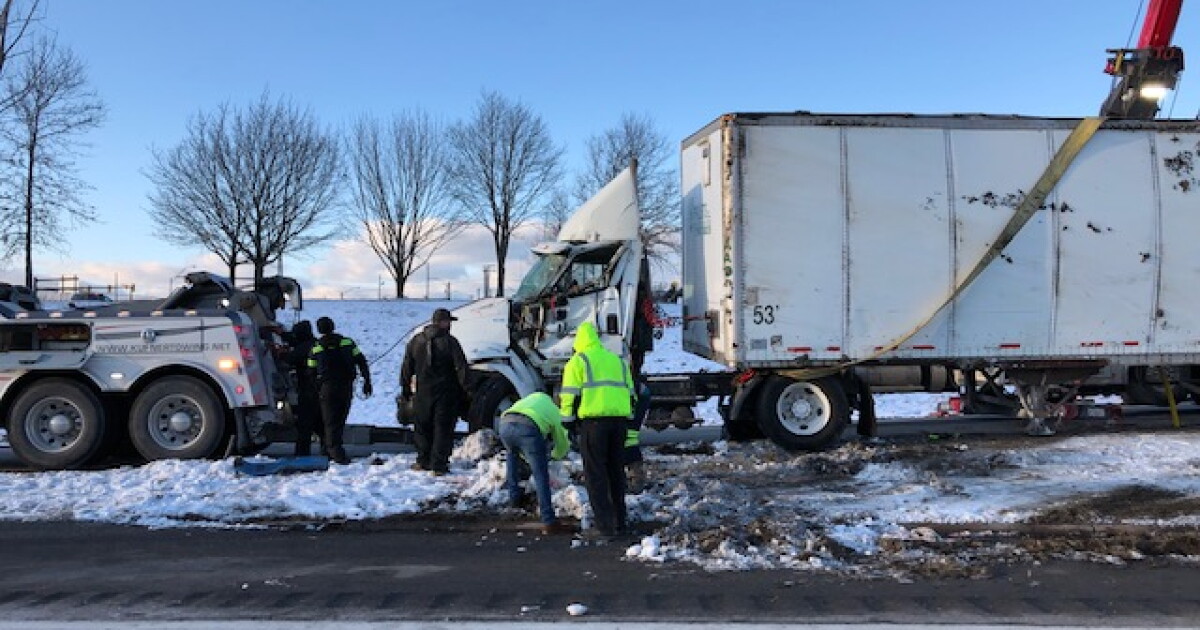 Overturned semi-truck snarls traffic on I-90 in Cleveland