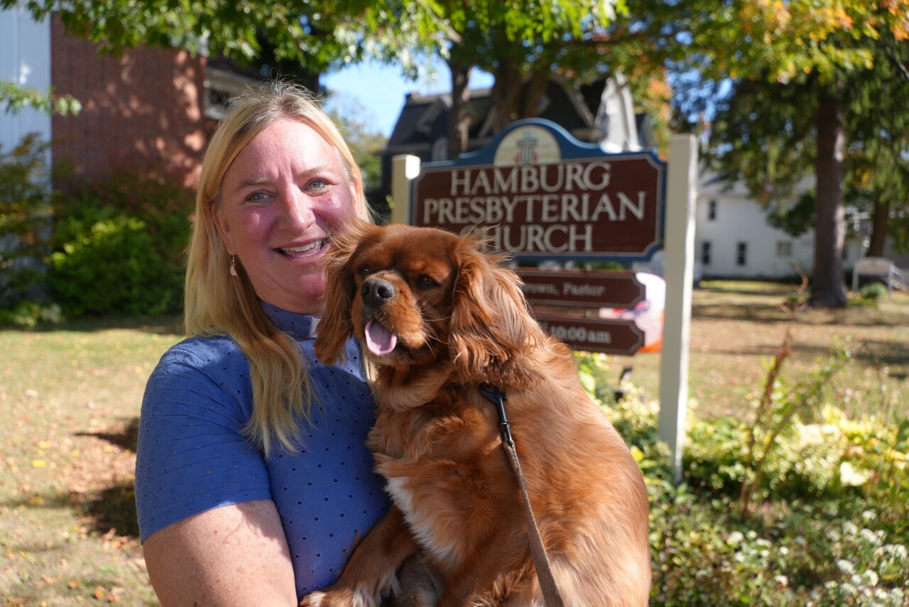 Reverend Rachel Brown and the church dog Indiana Jones Jr.