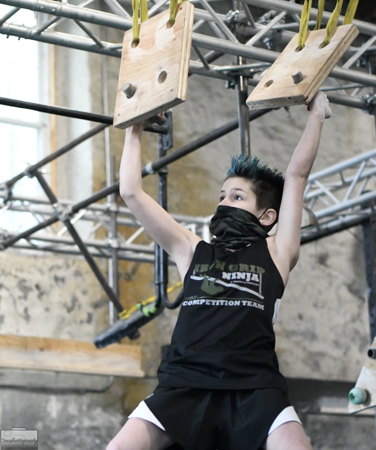 Tristin Martin racing through a ninja course