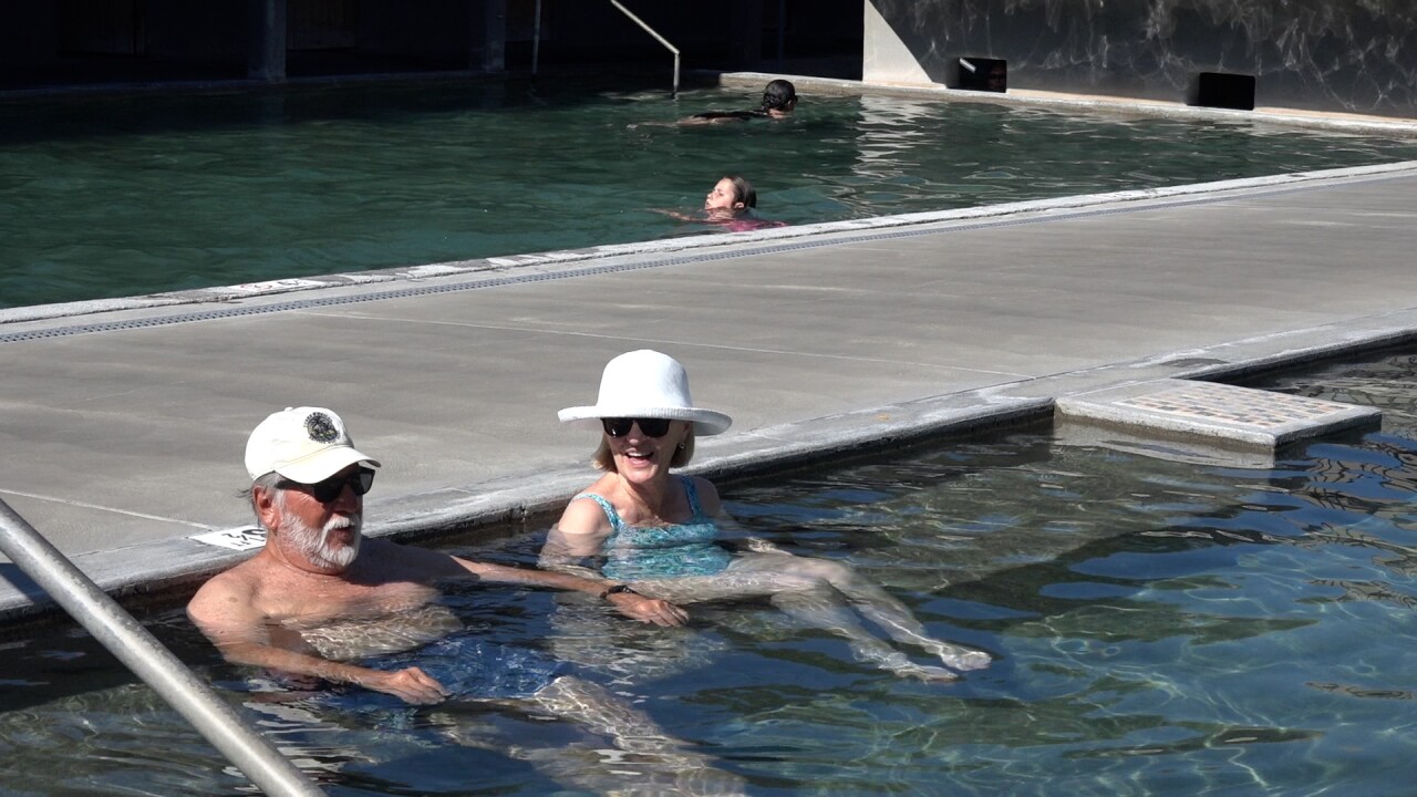 Paul and Linda relax in one of the outdoor pools