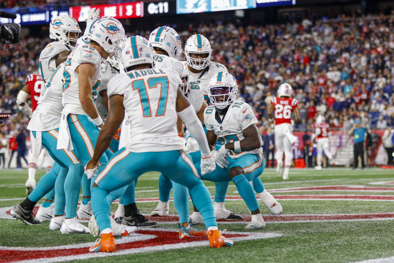 Miami Dolphins receiver Tyreek Hill celebrates with teammates after scoring TD in second quarter of 'Sunday Night Football' game at New England Patriots, Sept. 17, 2023