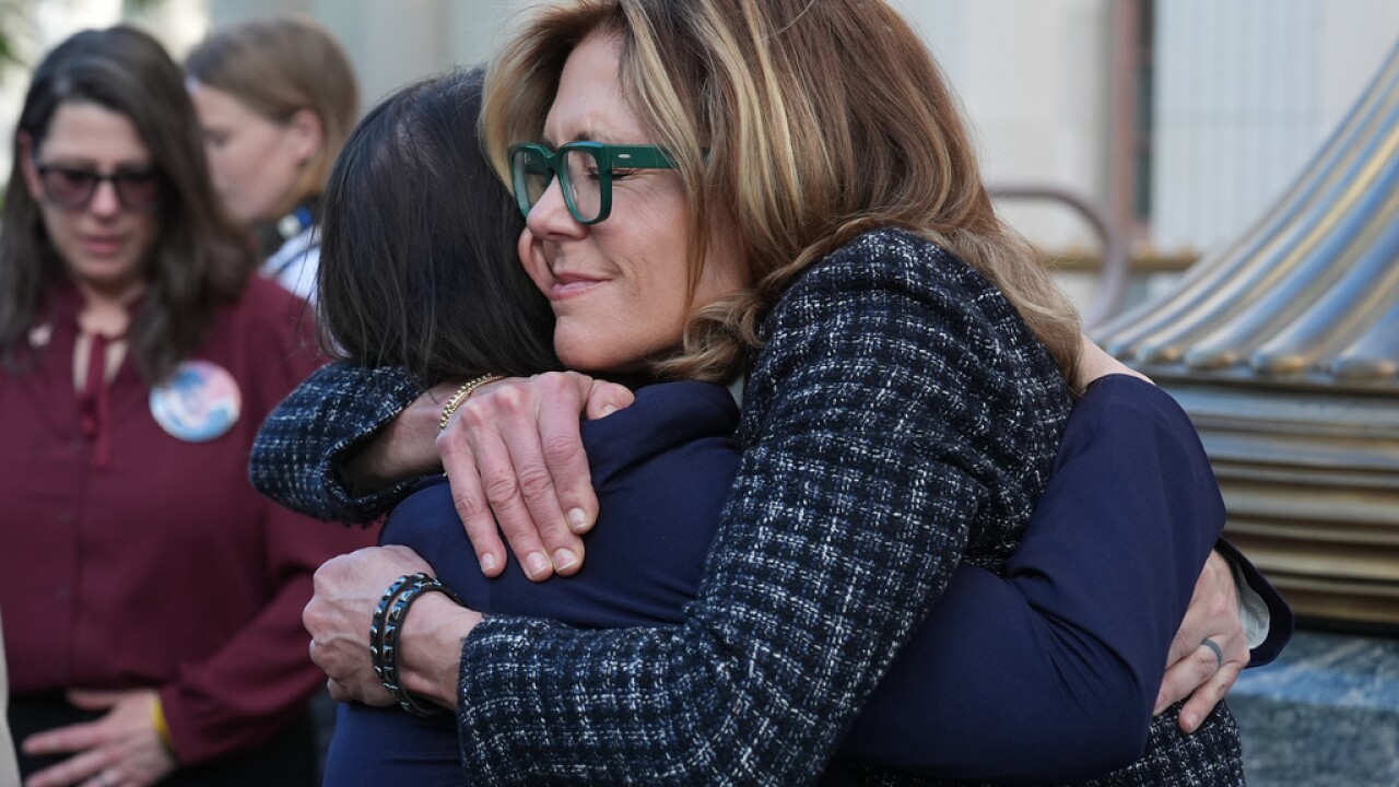 Laura Marquez-Garrett, Julianna Arnold