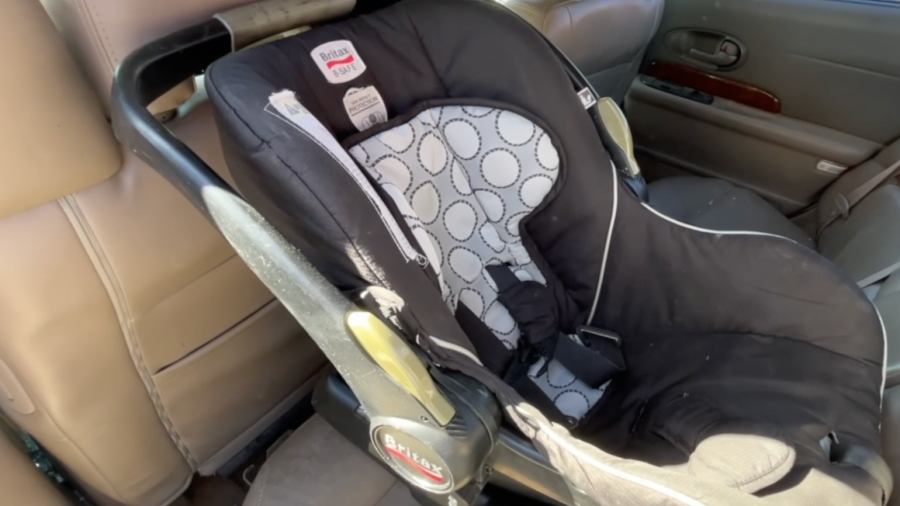 Baby car seat in the back of a car