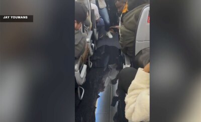 Jay Youmans and his family spent two and a half extra days at Connecticut airport after burst pipe sent water rushing down aircraft aisle