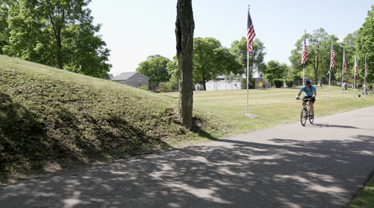 Cyclist at Maple Grove Cemetery