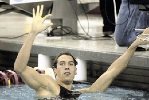 Simon Burnett flashes Wildcat sign for first time