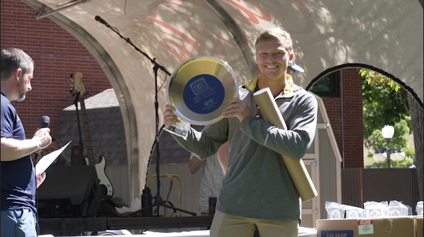 Layne Ryerson receiving his award for winning the 2024 Governor's Cup Marathon