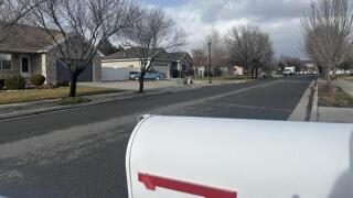 A photo of the area where the shooting occurred. It's daytime, and the street remains empty.