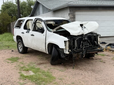 Victim's car remains in the family driveway in east Mesa
