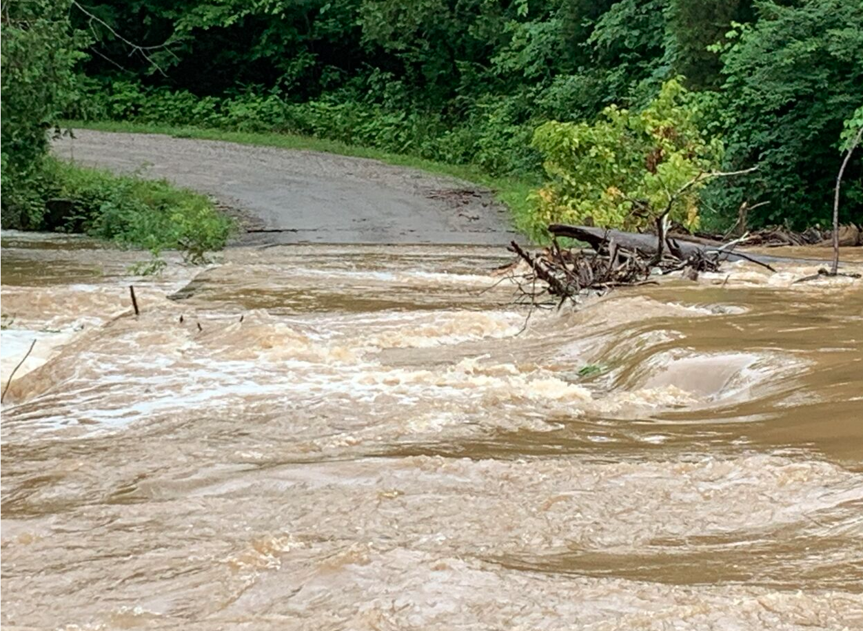 Floodwater submerged the bridge at Coffee Hollow Road on June 18, 2019.