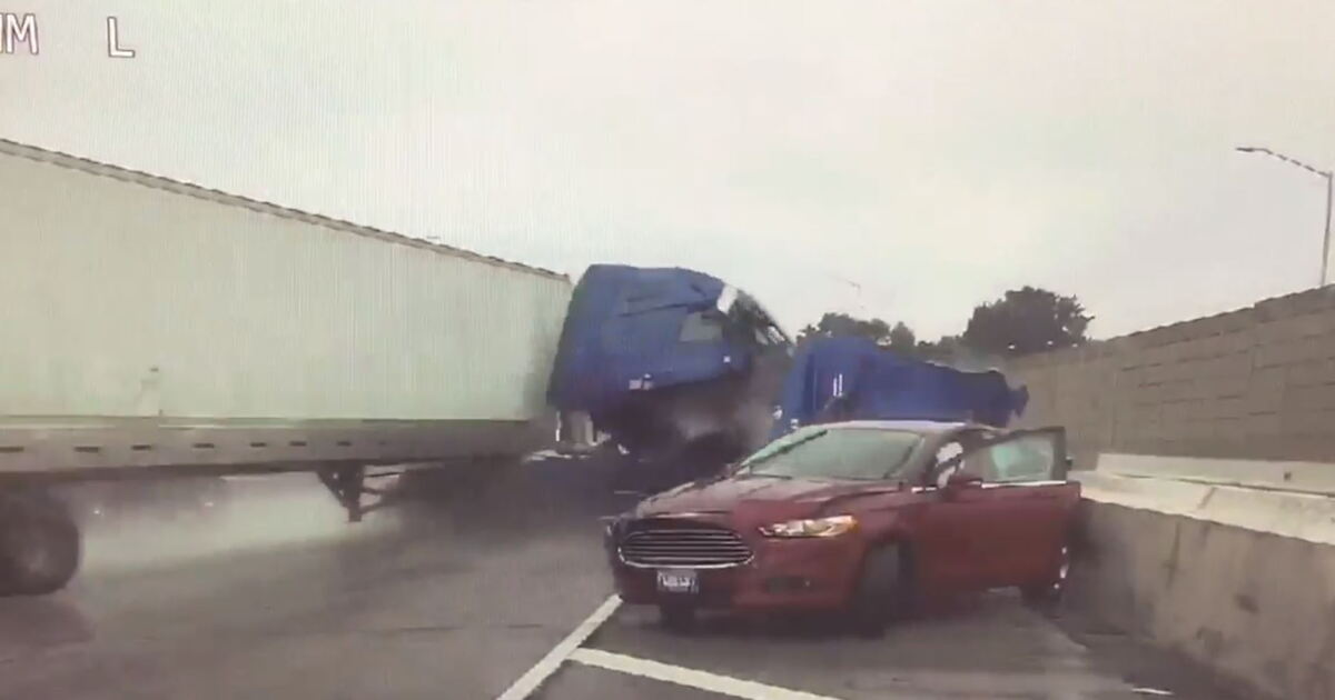 Intense video shows semi-truck crash into tow truck