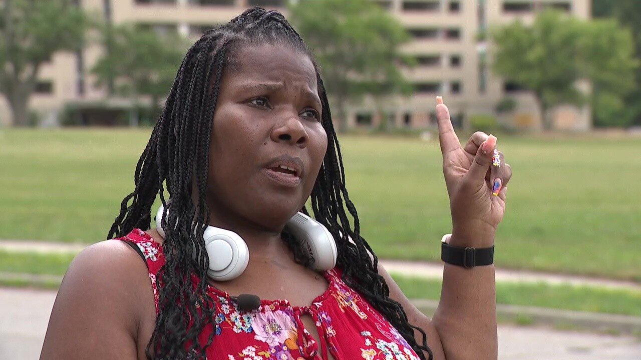 Jatana Burns-Reaves talks about the vacant apartment building down the block.