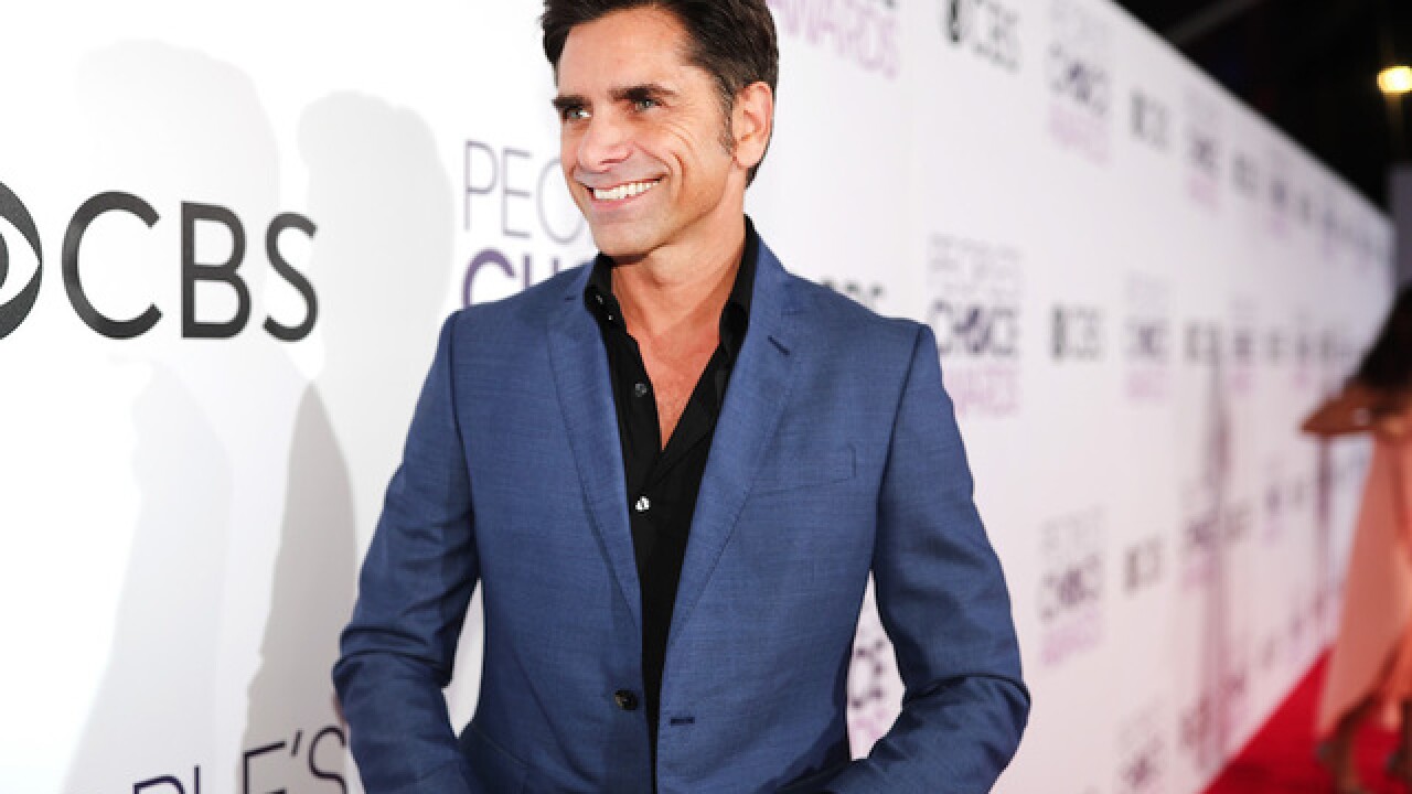 John Stamos and Caitlin McHugh get engaged