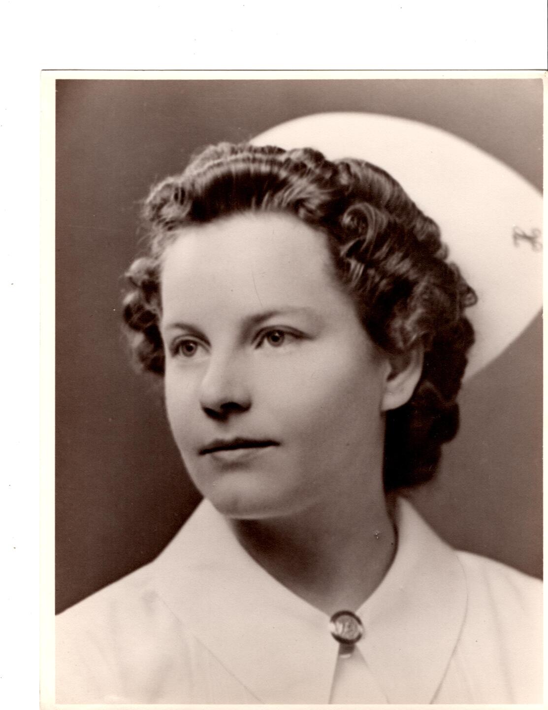 2 - Mom Nursing Grad Pic.jpg