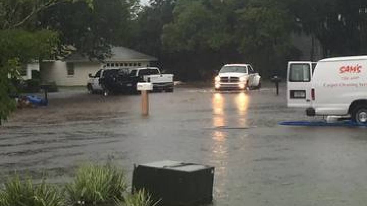 PHOTOS | Tropical system causing flooding