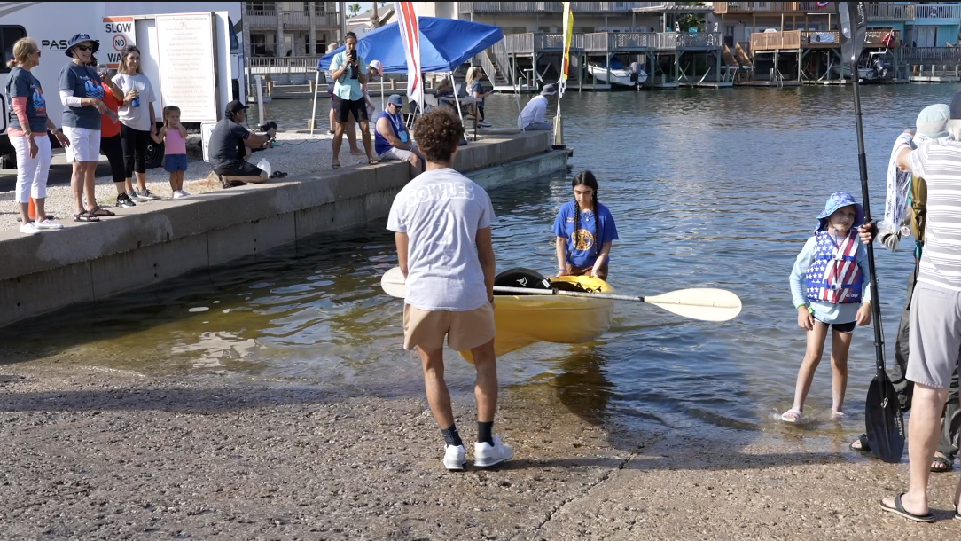 Members of the Flour Bluff Rotary Club were at this event to help Paddlers out of the water
