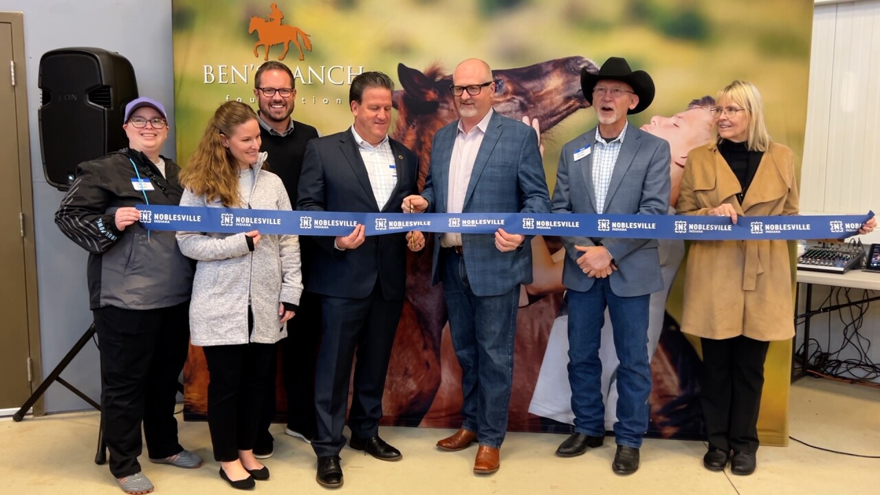 Ribbon cutting for new partnership.jpg