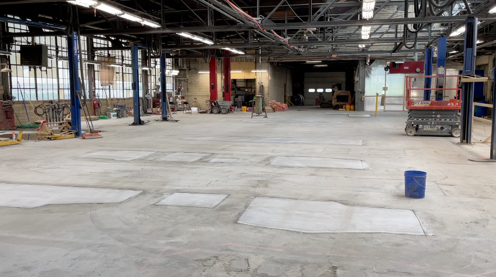 Crews are repairing the concrete floor at the city of Cincinnati's fleet garage, built in 1939.