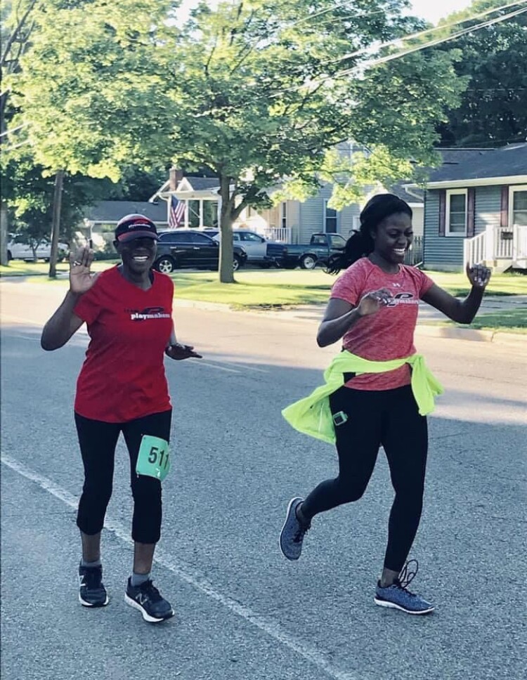 Frances Kaneene running with her daughter Tessa.