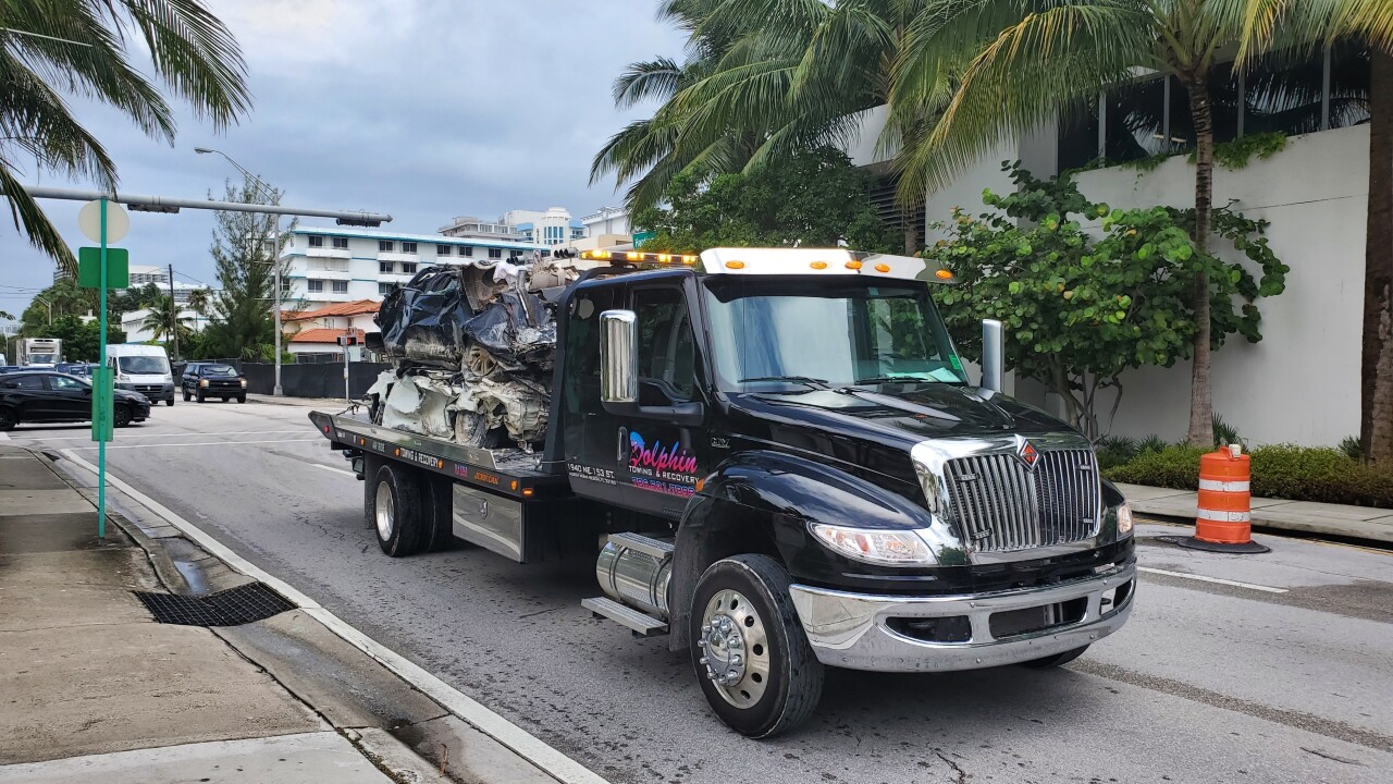 Vehicles cleared from Champlain Towers South wreckage hauled from site, July 10, 2021