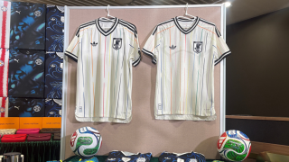 Hong Kong customs authorities showcase real jersey, left, and fake jersey, right, during a news conference at its headquarters in North Point, Hong Kong Thursday, June 11, 2026. 