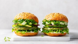 Vegan,Burgers,With,Vegetables,Patty,On,A,Marble,Cutting,Board.