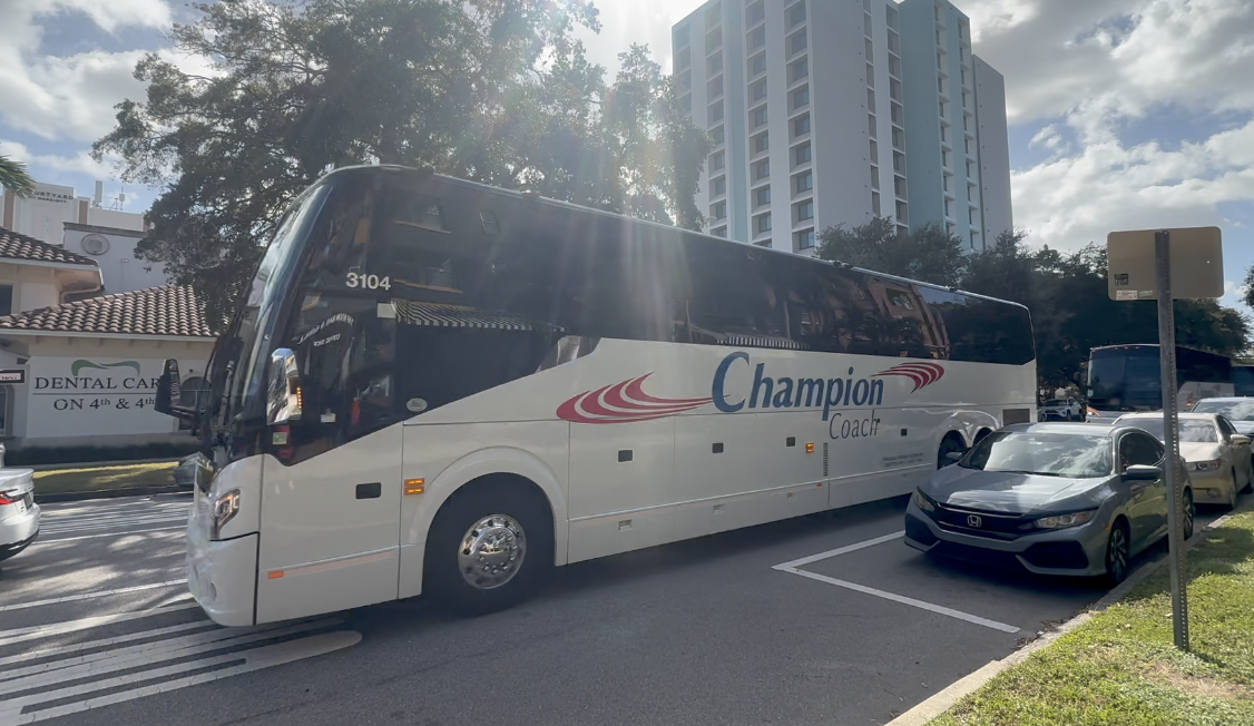 Buses with police escort move through St. Pete