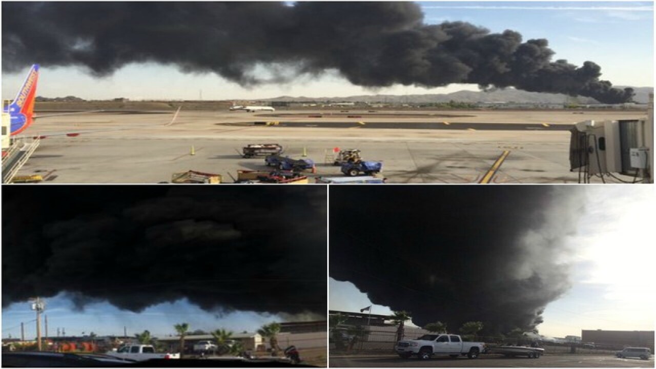 PHOTOS: Fire burns at PHX recycling plant