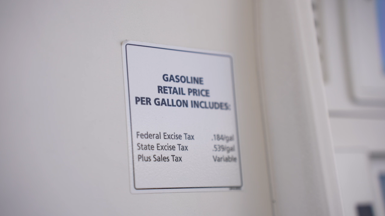taxes listed at gas pump