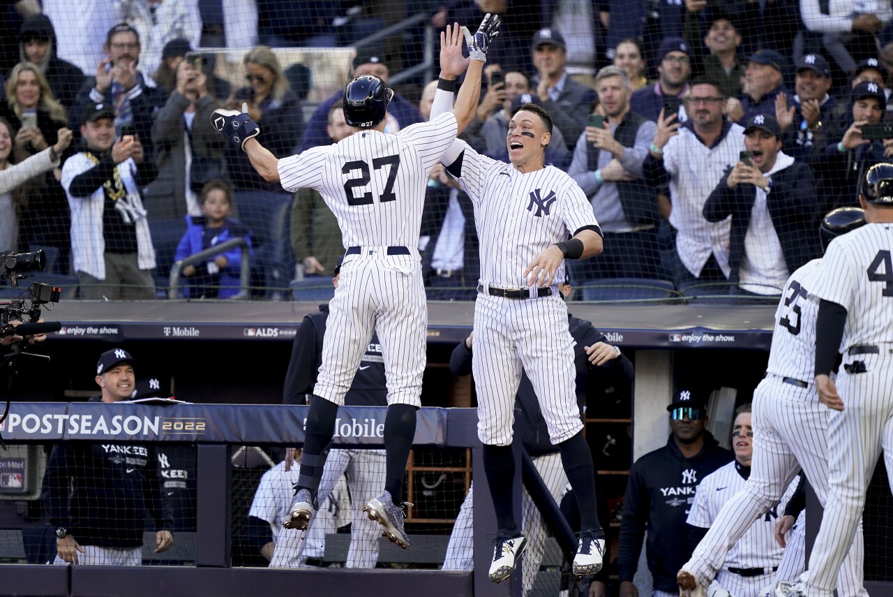 New York Yankees teammates Giancarlo Stanton and Aaron Judge celebrate after home run vs. Cleveland Guardians in AL Division Series, Oct. 18, 2022
