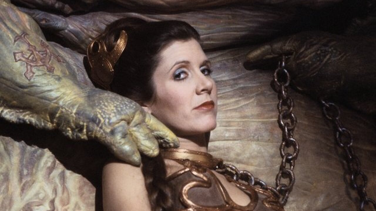 Carrie Fisher says Star Wars VII 'is cursed' - NZ Herald