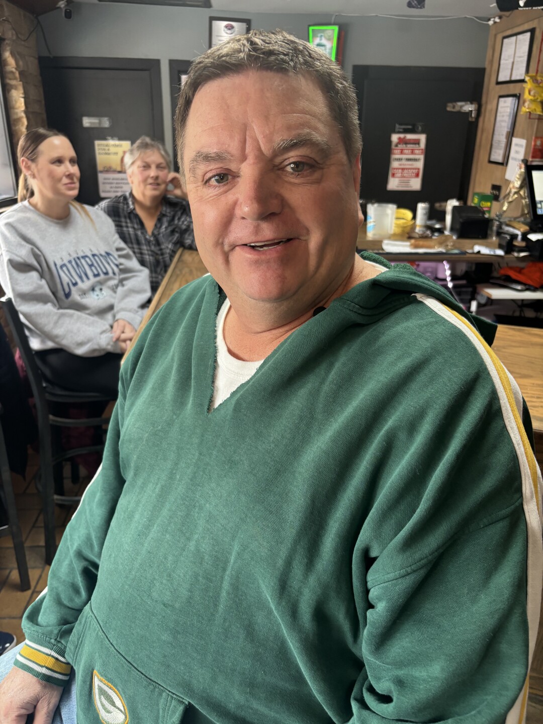 Joe Thomas celebrates Thanksgiving with friends during the Green Bay Packer football game at Eddie's Lake House Bar in West Bend