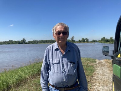 John Poore next to his gator on the Mills County Missouri River levee
