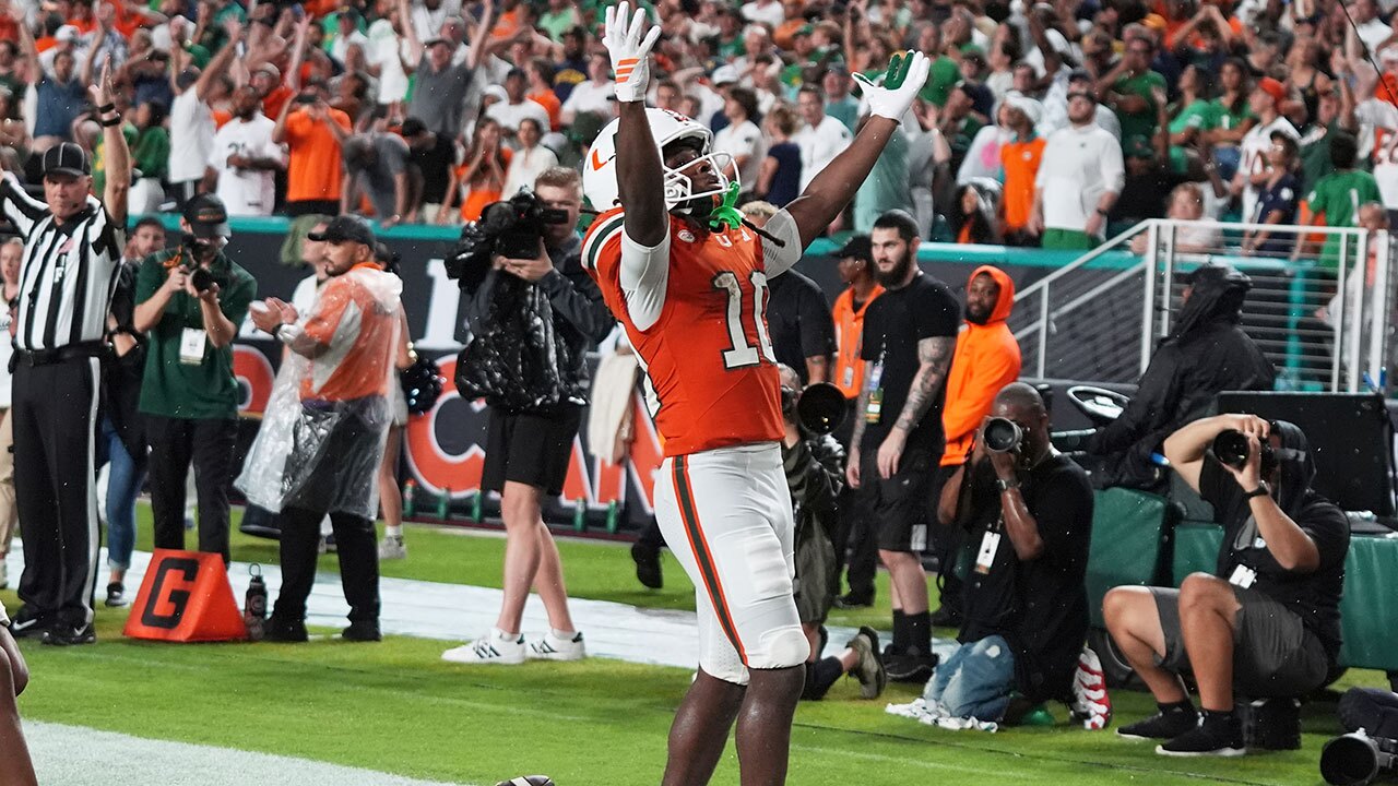 Miami wide receiver Malachi Toney celebrates after scoring a touchdown during the first half of an NCAA college football game against Notre Dame, Sunday, Aug. 31, 2025, in Miami Gardens, Fla. (AP Photo/Lynne Sladky)