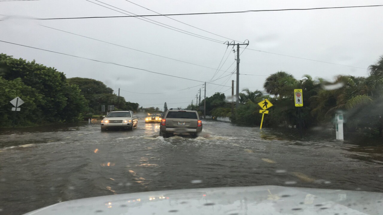 PHOTOS | Tropical system causing flooding