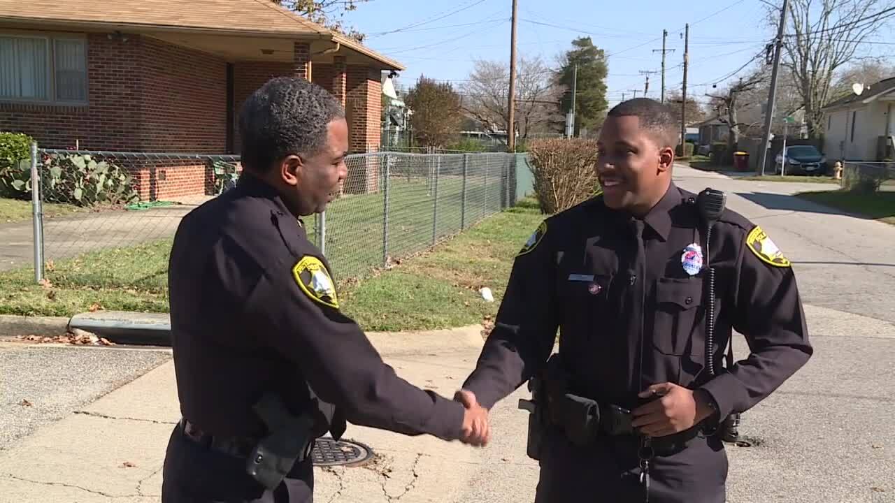 Petersburg Police Chief Travis Christian and officer Michael Majors.