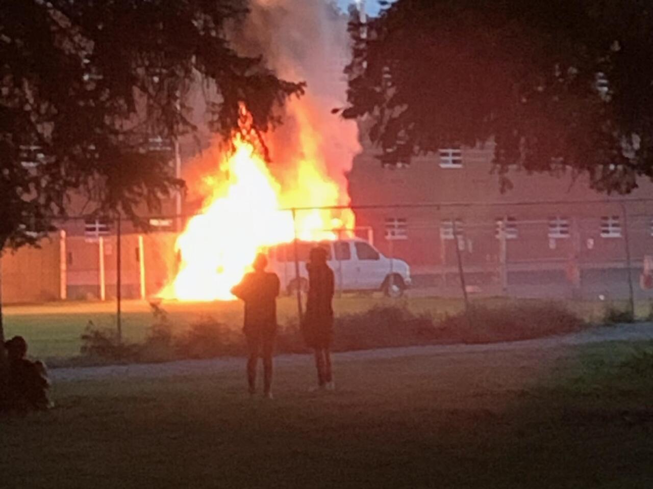 The double vehicle fire at Senior High was reported at 7:37 p.m. Sunday