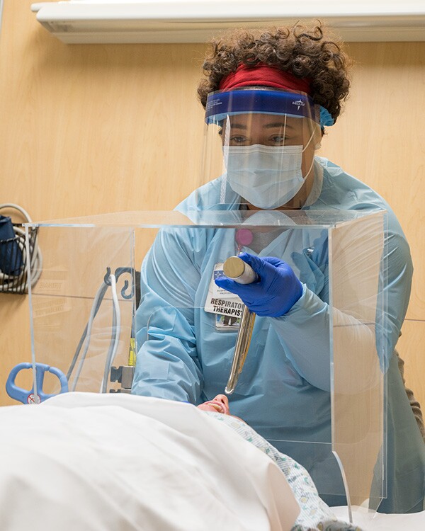 Trinae Jones, a 15-year Mercy respiratory therapist, created the plexiglass cube.