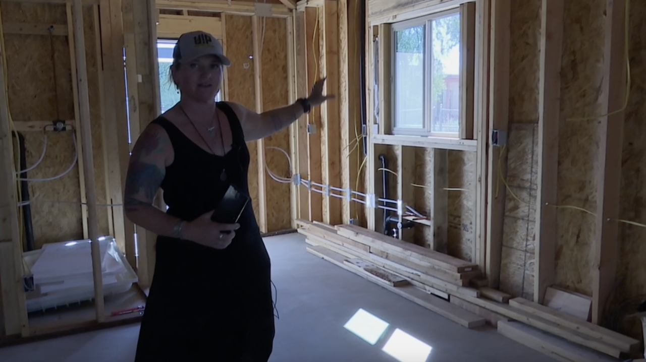 Urban Infill Project co-founder Valerie Lane at a home under construction