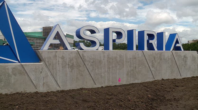 Aspiria Monument Sign.png