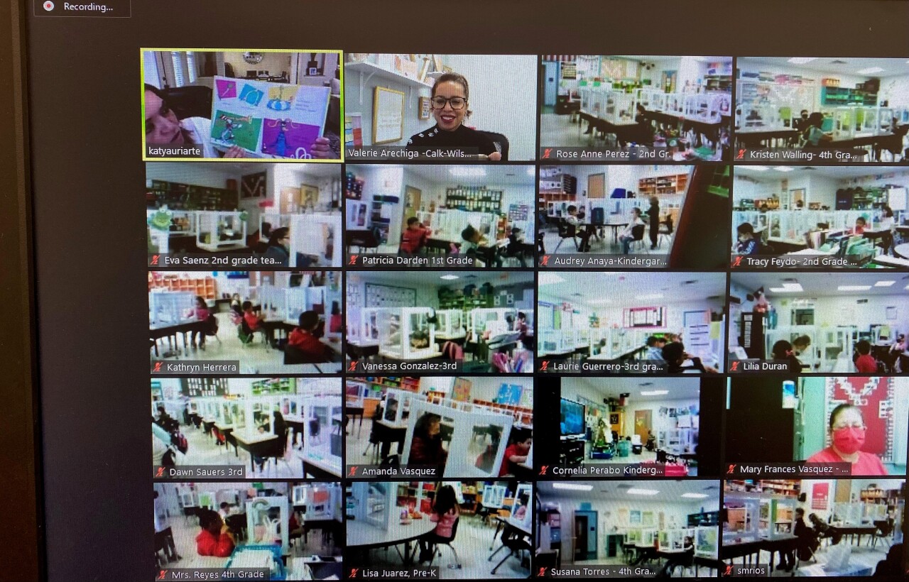 Katia Uriarte reads to the school.jpg