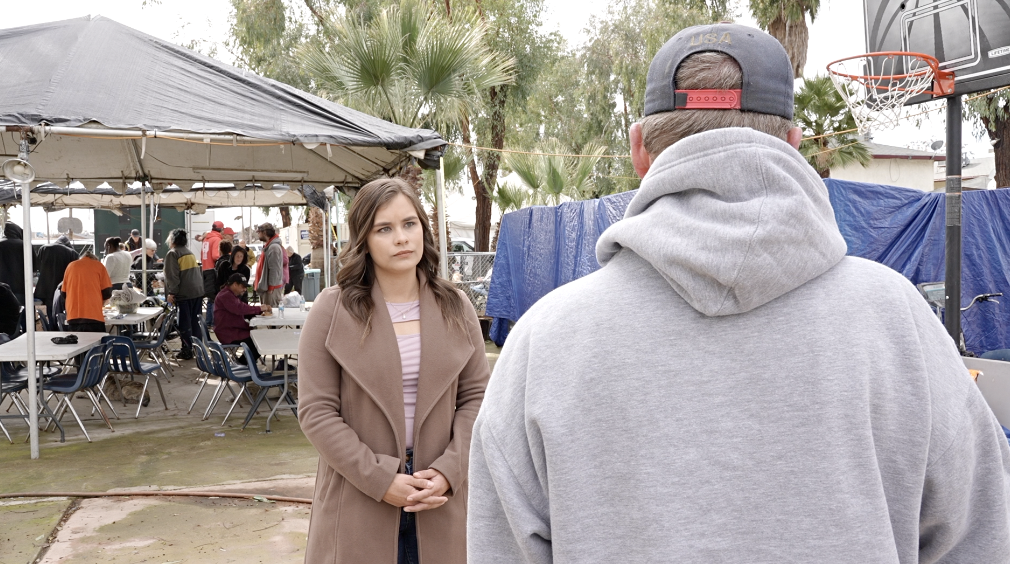 Bakersfield Neighborhood News Reporter Veronica Morley talking with Russell Smith, a potential resident