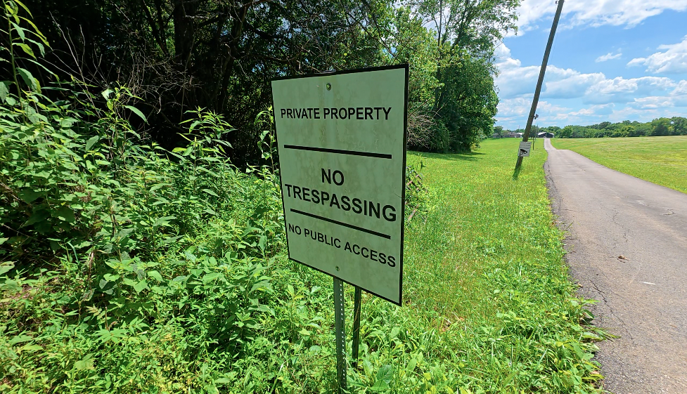 Signs outside the entrance to Crossroads Church Base Camp on Burns Road in Washington Township.