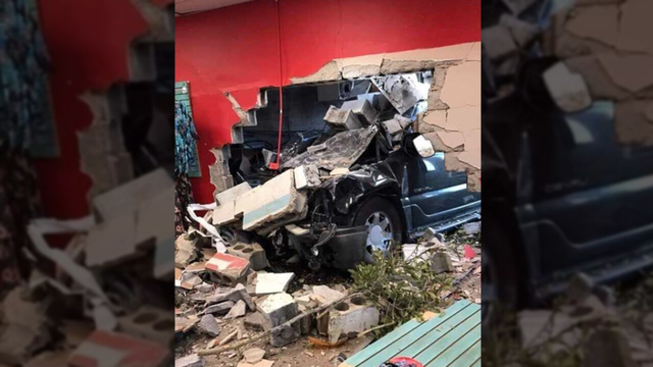 Image result for car crash into building